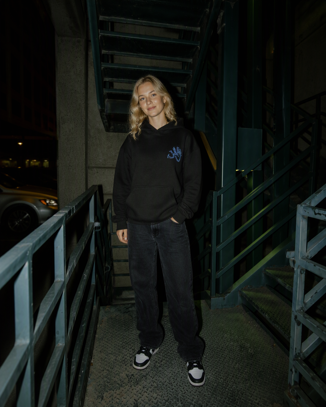 Black Forest hoodie in a digitally created campaign portrait of an adult woman