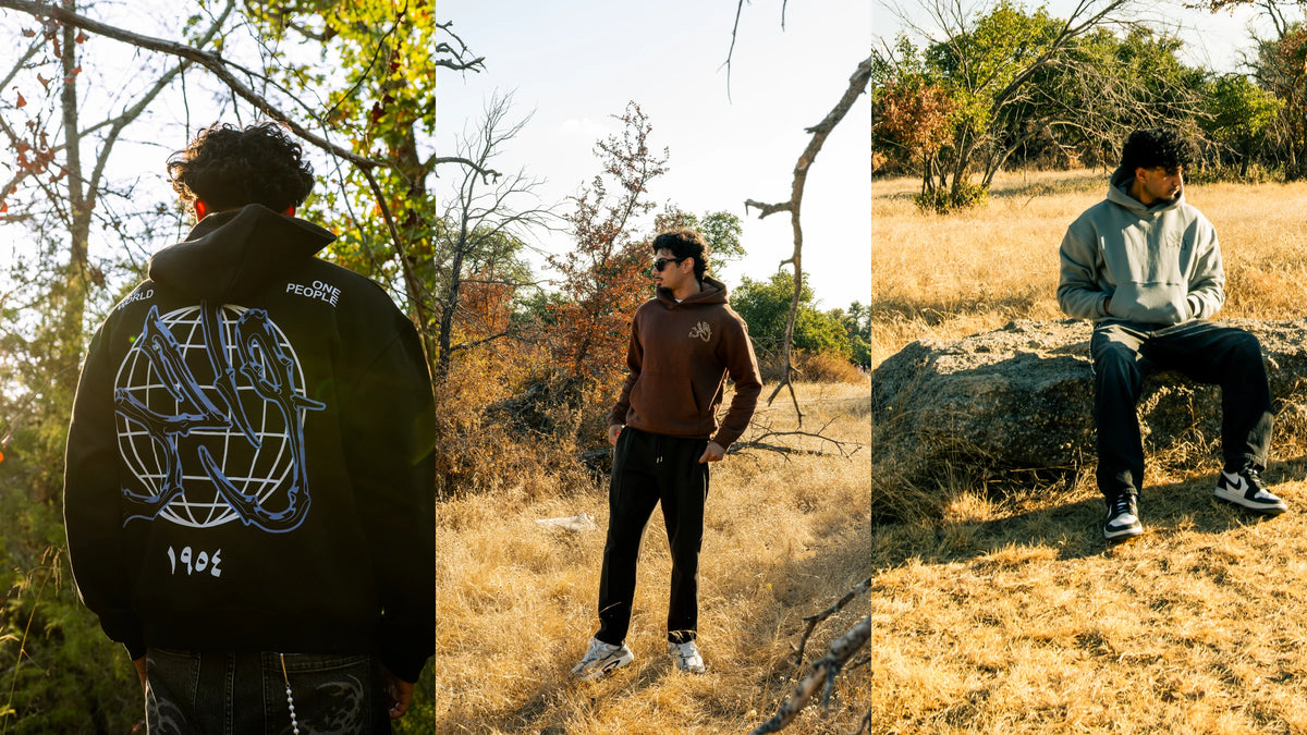 Three people outdoors wearing Black Forest, Mocha and Gray Wahid hoodies